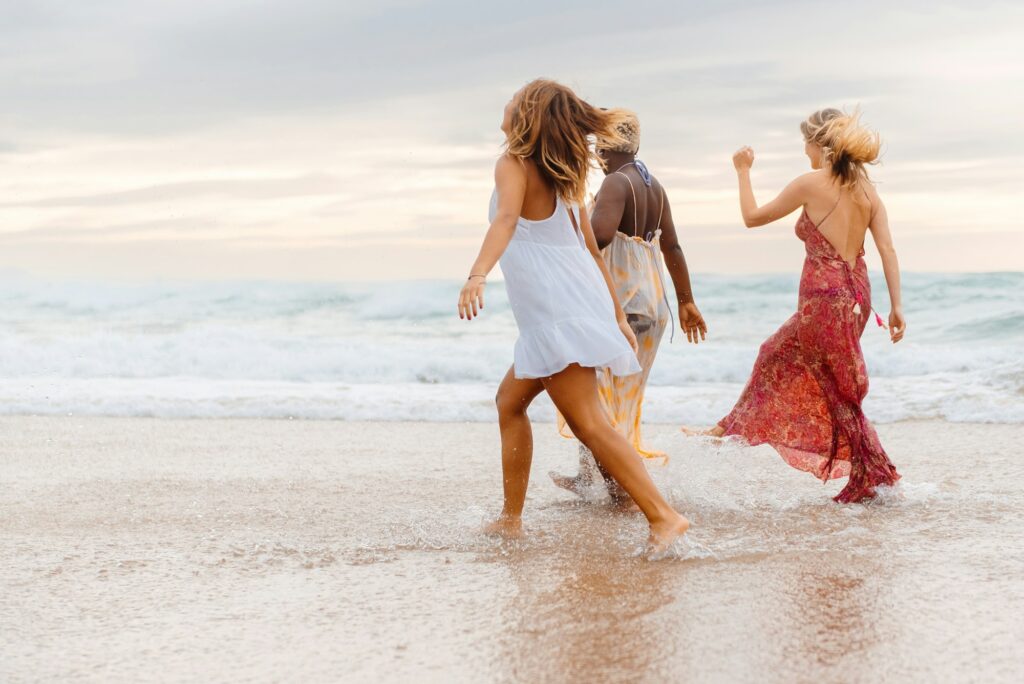 multiracial group of girls on the beach