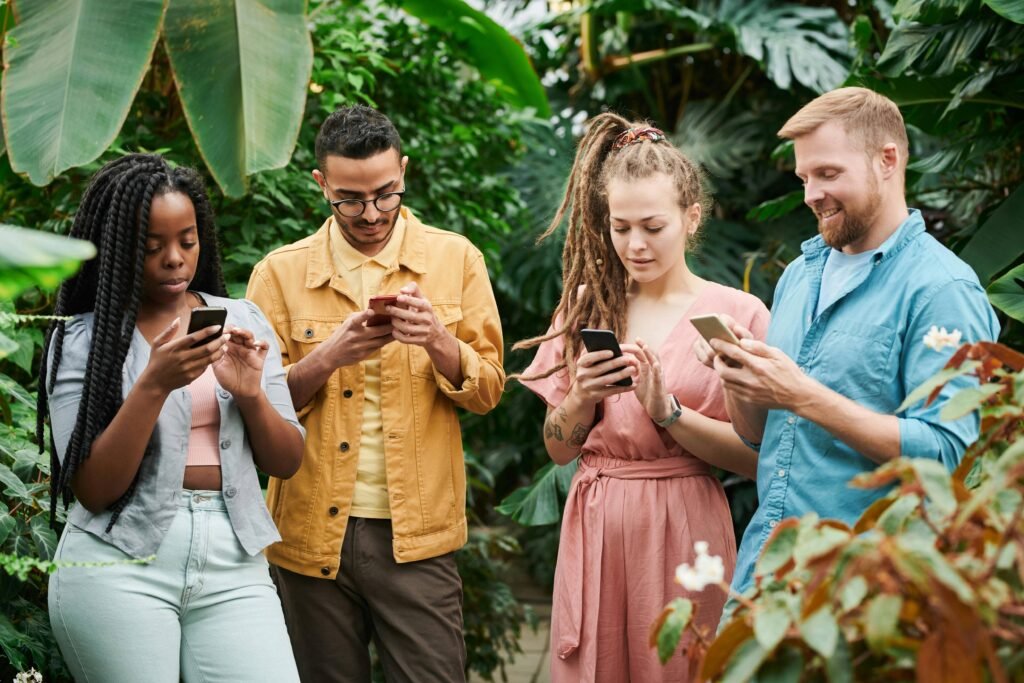 happy people texting on phones