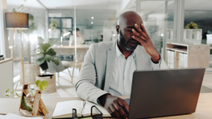 Professional experiencing executive burnout and work stress